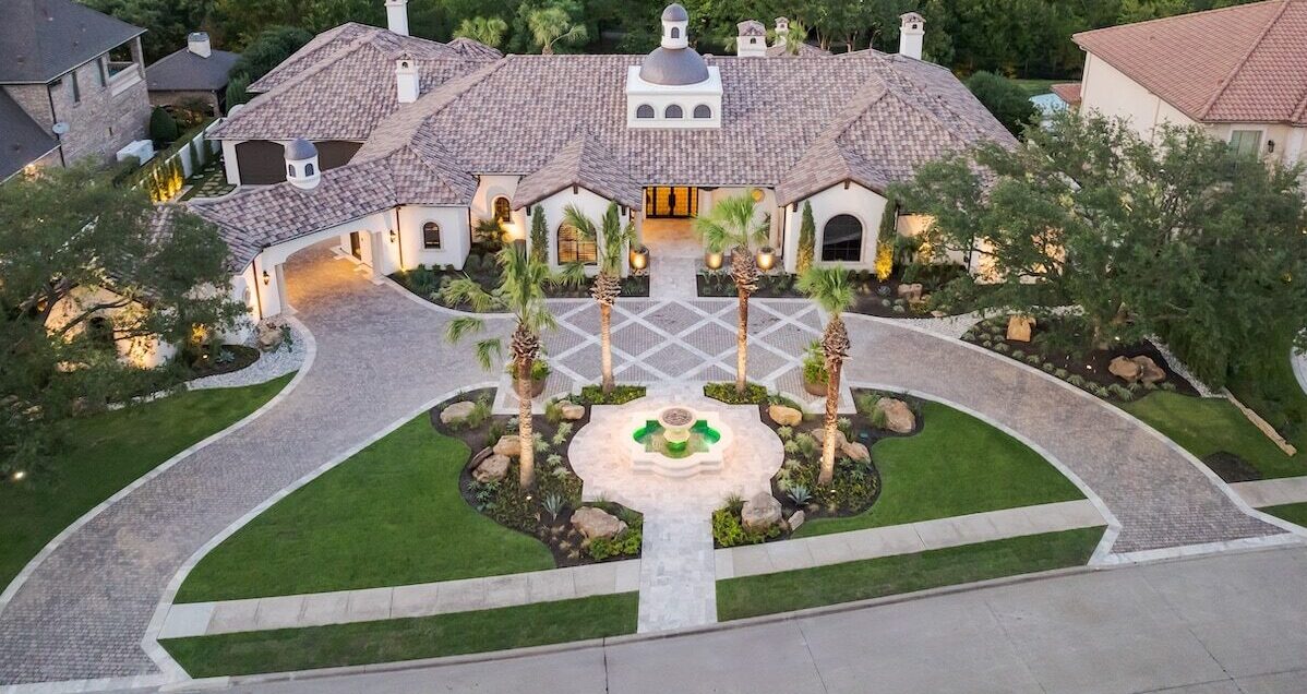 front of house with beautiful landscaping in Dallas
