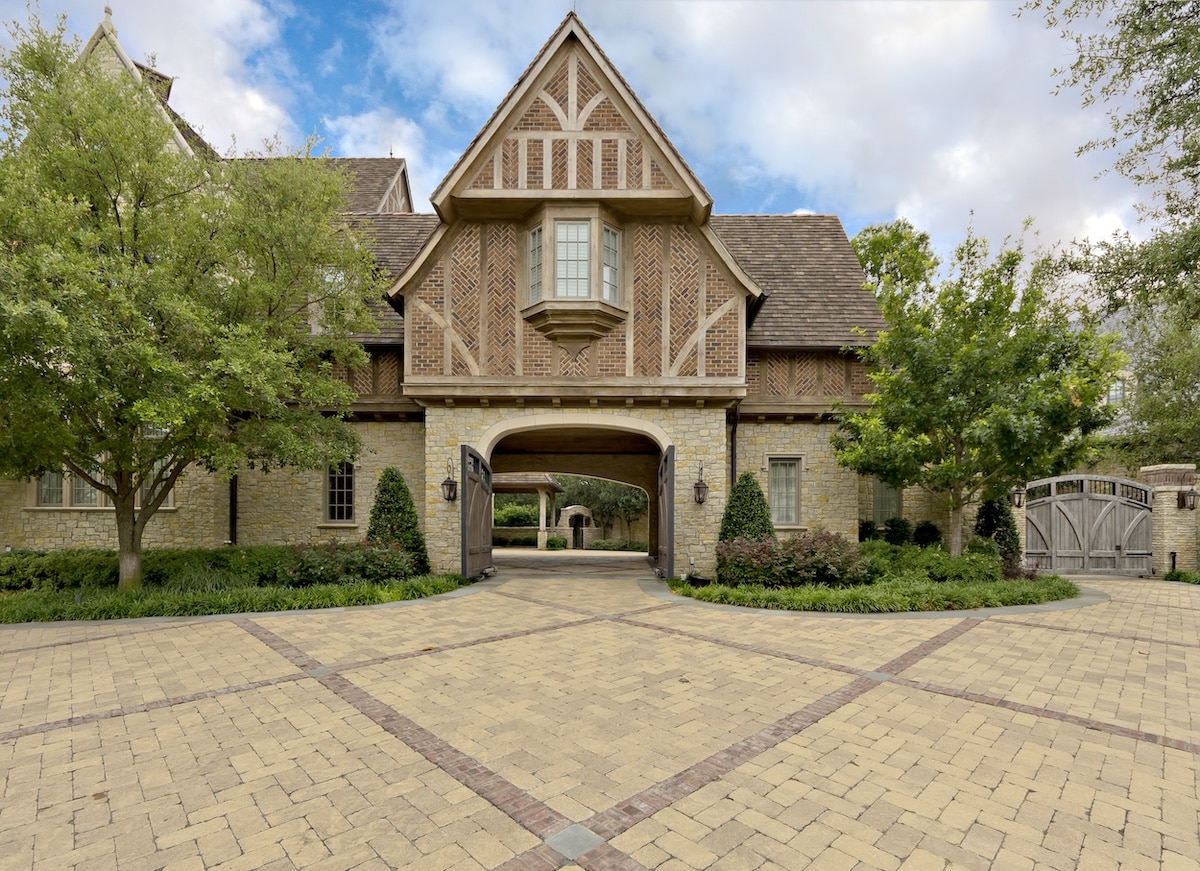 front entry with custom pavers and gates