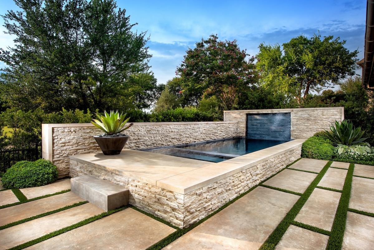 hand-carved Leuders limestone pool in Dallas