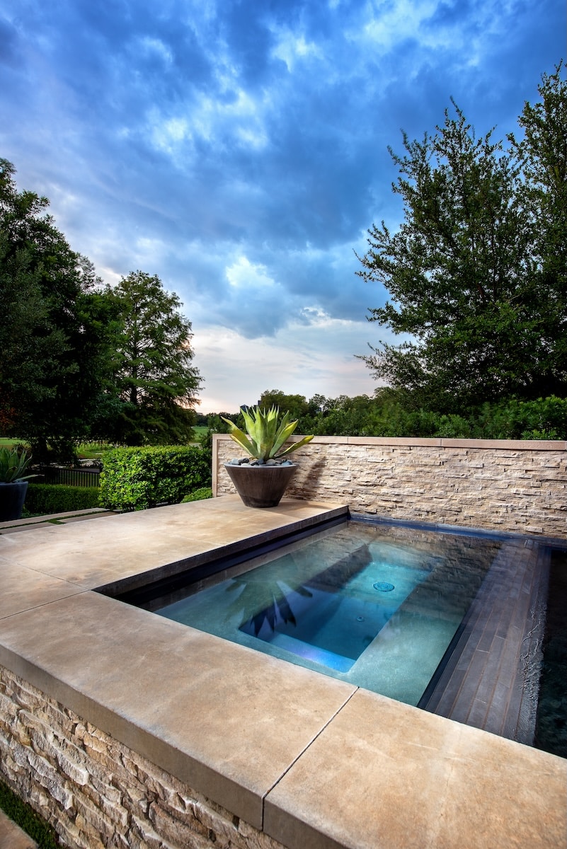 pool entry steps and backyard landscaping